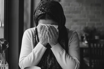 Woman Finding Comfort While Wiping Tears