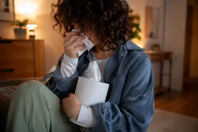 Comforting Portrait of Woman Wiping Tears