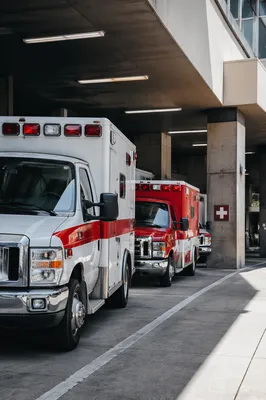 Emergency Ambulances at Modern Hospital Entrance