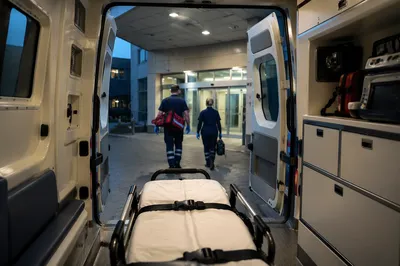 Ambulance at Modern Hospital Entrance
