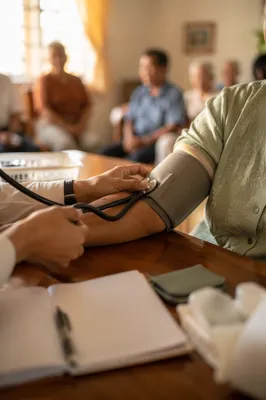 Compassionate Blood Pressure Check in Fellowship Room