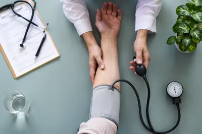 Routine Blood Pressure Check on Clinic Table