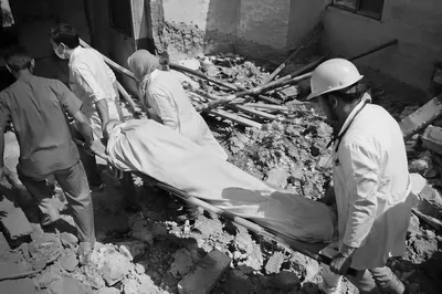 Emergency Team in Damaged Hospital Courtyard