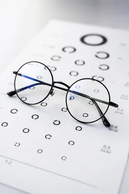 Eyeglasses on Optometry Vision Chart Close-Up