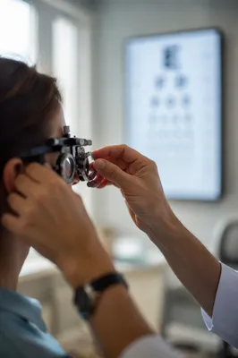 Modern Optometry Eye Exam With Vision Chart