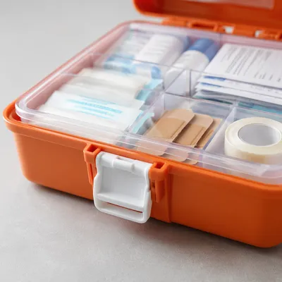 Open Orange First Aid Kit Supplies
