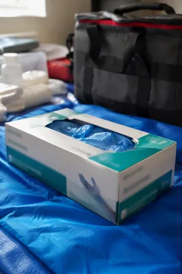 Disposable Gloves on Emergency First Aid Blanket