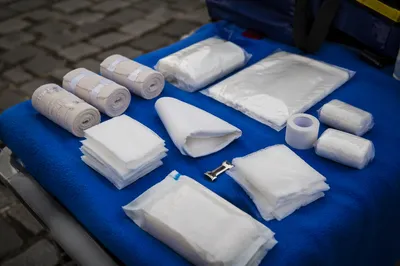 Outdoor First Aid Supplies on Blue Blanket