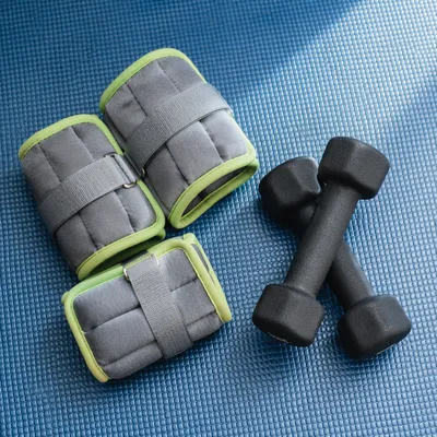 Home Rehabilitation Weights on Blue Mat