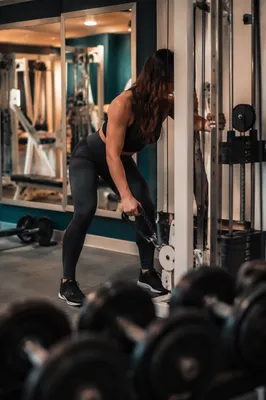 Woman Cable Row in Rehab Fitness Gym