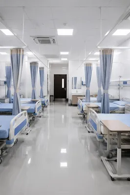 Clean Hospital Ward Interior With Empty Beds