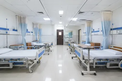 Clean Hospital Ward Interior with Empty Beds
