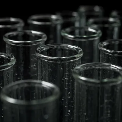 Macro Laboratory Test Tubes on Dark Bench