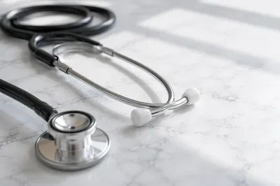 Close-Up Stethoscope on White Marble