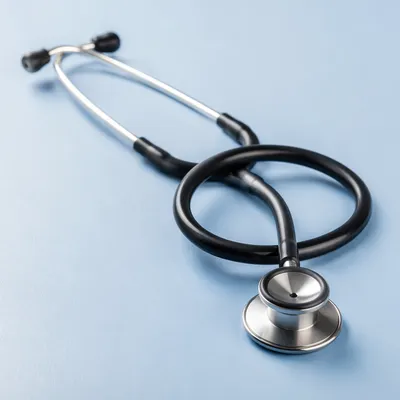 Close Up Medical Stethoscope on Blue