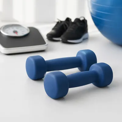 Blue Therapy Dumbbells on Clinic Floor
