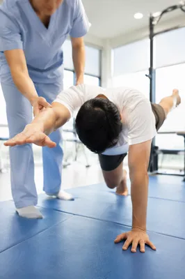 Physical Therapy Bird Dog Rehabilitation Session