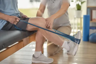 Physical Therapy Leg Extension Rehabilitation Session