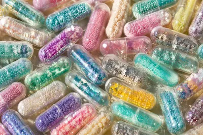 Colorful Capsule Pattern with Glitter Particles