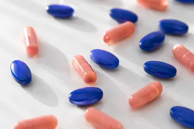 Assorted Medicine Pills on White Table