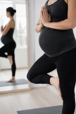 Prenatal Tree Pose in Wellness Studio