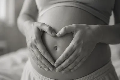 Protective Heart Hands on Pregnant Belly