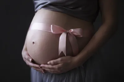 Gentle Maternity Belly With Blush Ribbon