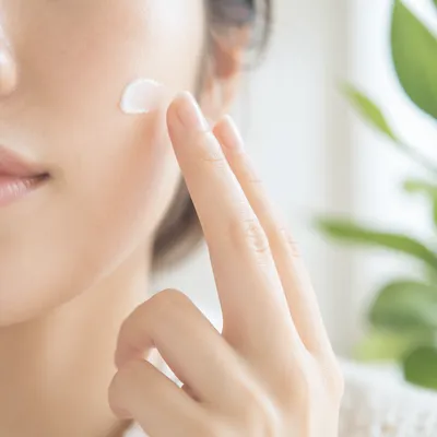 Close-Up Skincare Cream Application in Clinic