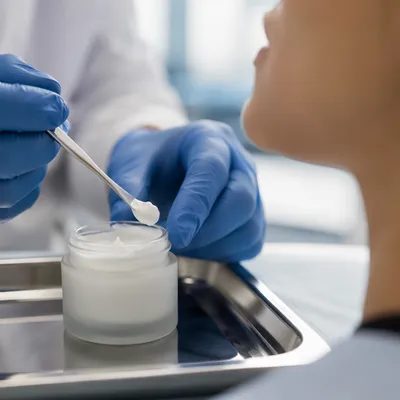 Clinical Skincare Cream Application Close Up