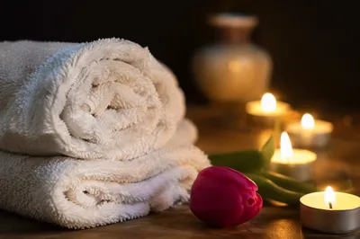 Warm Spa Massage Towels With Candles