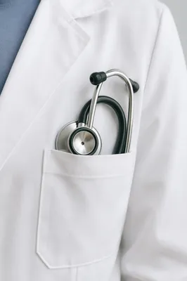 Stethoscope in White Coat Pocket Close-Up