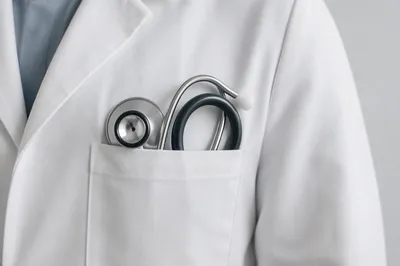 Stethoscope in White Coat Pocket Close-Up