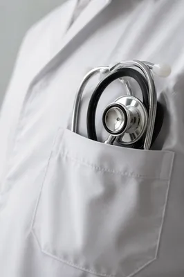 Stethoscope in White Coat Pocket Close-Up