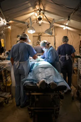 Field Operating Room Medical Team at Work
