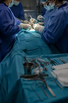 Medical Team Performing Surgery in Operating Room