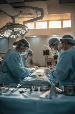 Hopeful Surgical Team in Operating Room