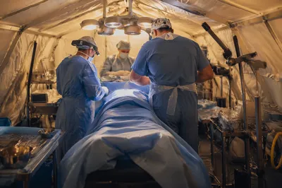Field Operating Room Medical Team at Work