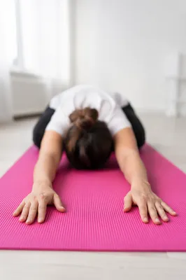 Peaceful Restorative Stretch on Pink Yoga Mat