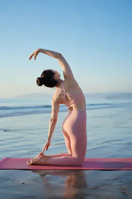 Peaceful Therapeutic Yoga Stretch on Quiet Beach