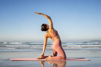 Peaceful Therapeutic Yoga Stretch on Beach