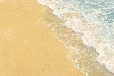 Tropical Shoreline Waves on Golden Sand