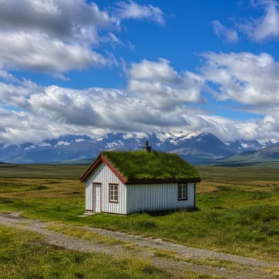 White Cottage in Vast Green Meadow