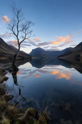 Calm Mountain Lake Reflection at Dawn