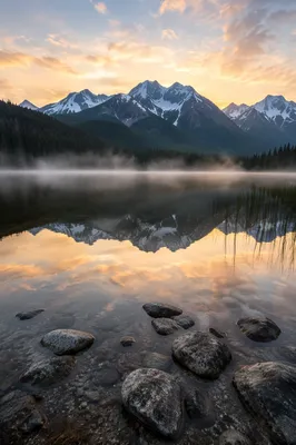 Calm Alpine Lake Reflection at Sunrise