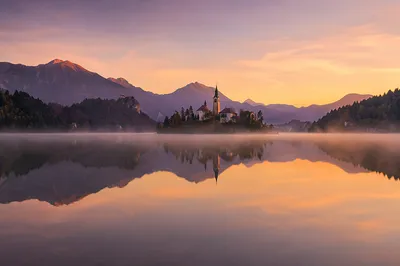 Calm Alpine Lake Reflection at Dawn