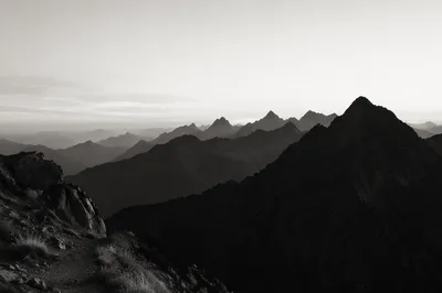 Panoramic Mountain Range at Quiet Dawn