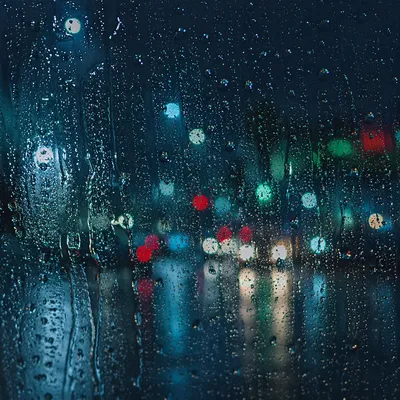 Rain Droplets on Window at Night