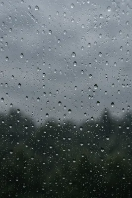 Rain Droplets on Blurred Window Glass