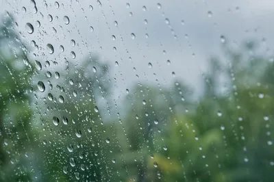 Rain Drops on Blurred Window Glass