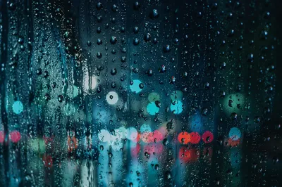 Rain Droplets on Window at Night